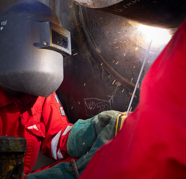 Welder at Euro Mechanical manufacturing facility