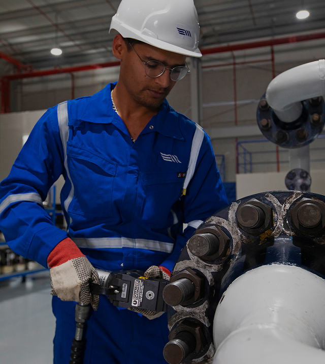 Worker performing precision industrial work